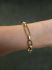 18 karaat schakelarmband rond