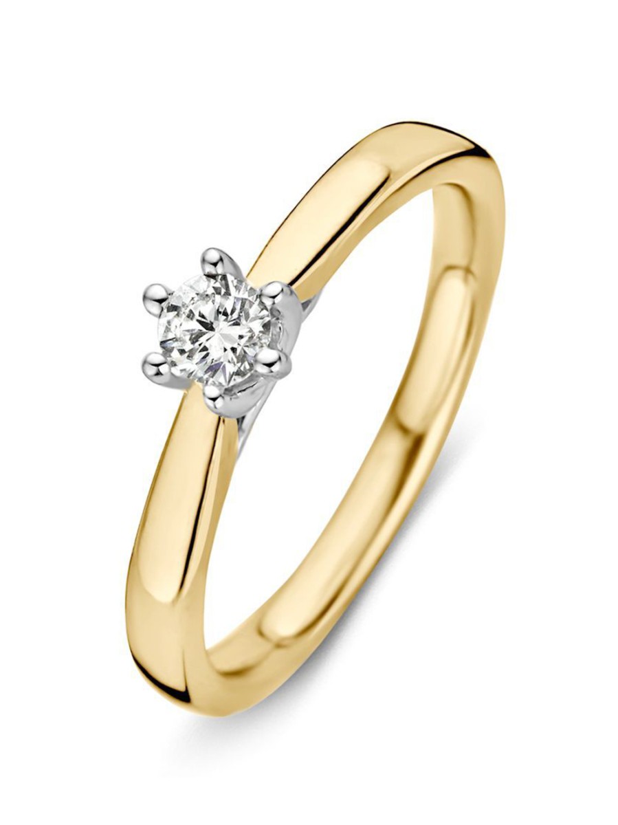 Bicolor gouden solitairring met 0,24crt. Bicolor gouden solitairring met 0,24crt.