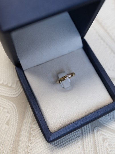 Vintage bicolor gedraaide ring met 2 diamanten