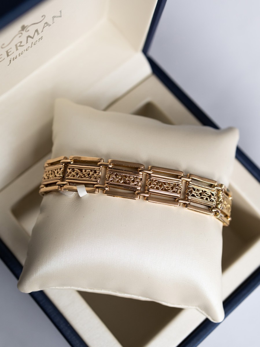 Vintage geelgouden schakelarmband met parelslot Vintage geelgouden schakelarmband met parelslot